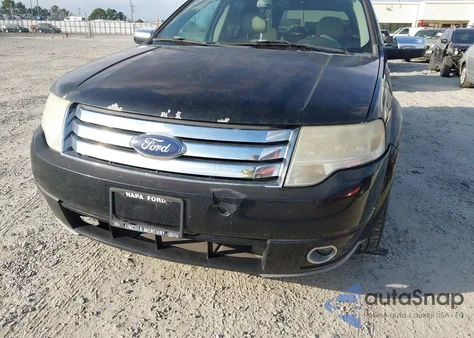 2008 Ford Taurus X Limited z USA, uszkodzony, nr VIN 1FMDK06W28GA06677